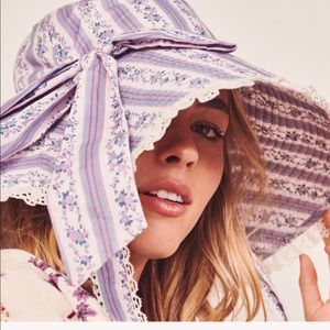 Loveshackfancy sun hat with large bow and tie straps